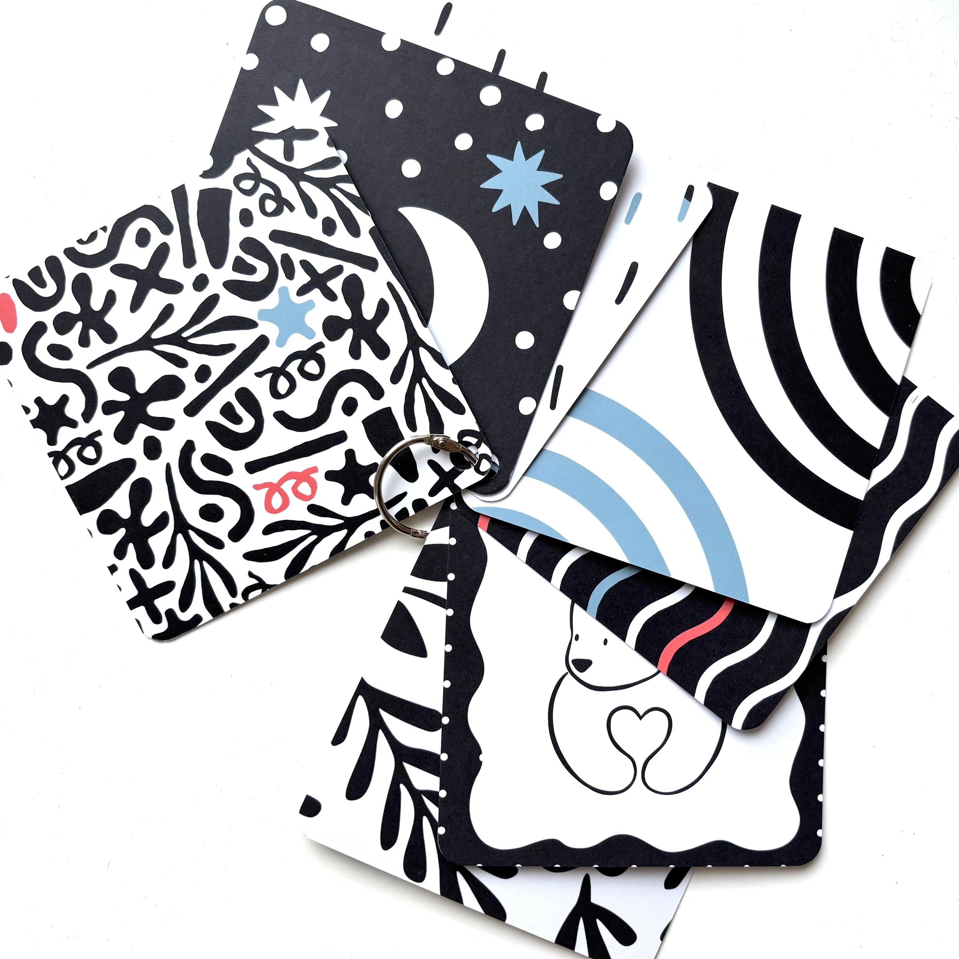 Set of black and white patterned cards on a white background