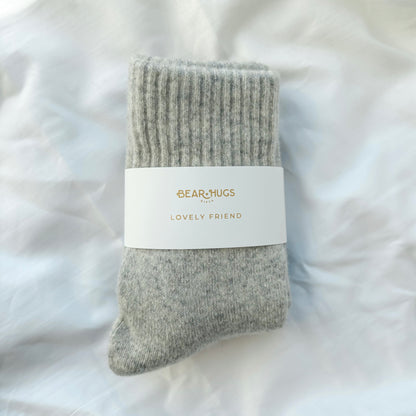 Gray sock with a label on a white background
