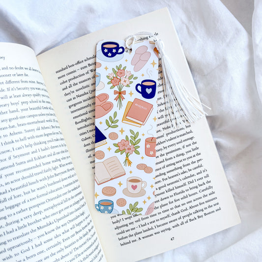 Decorative bookmark with illustrations on an open book